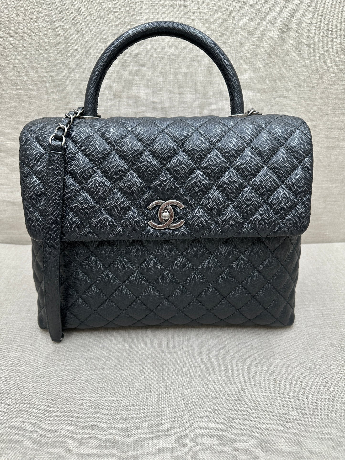 Chanel Maxi Flap Bag top handle