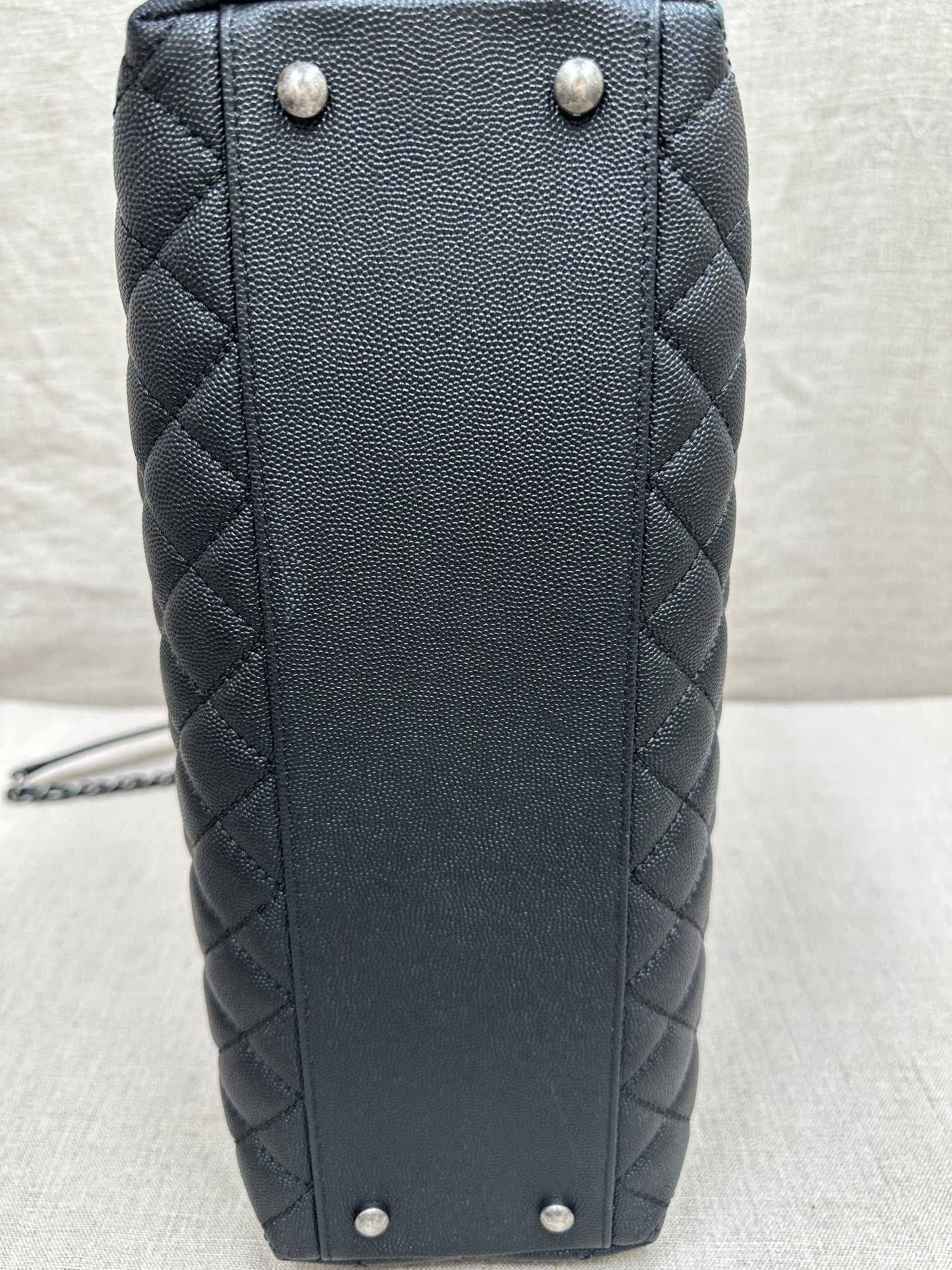 Chanel Maxi Flap Bag top handle