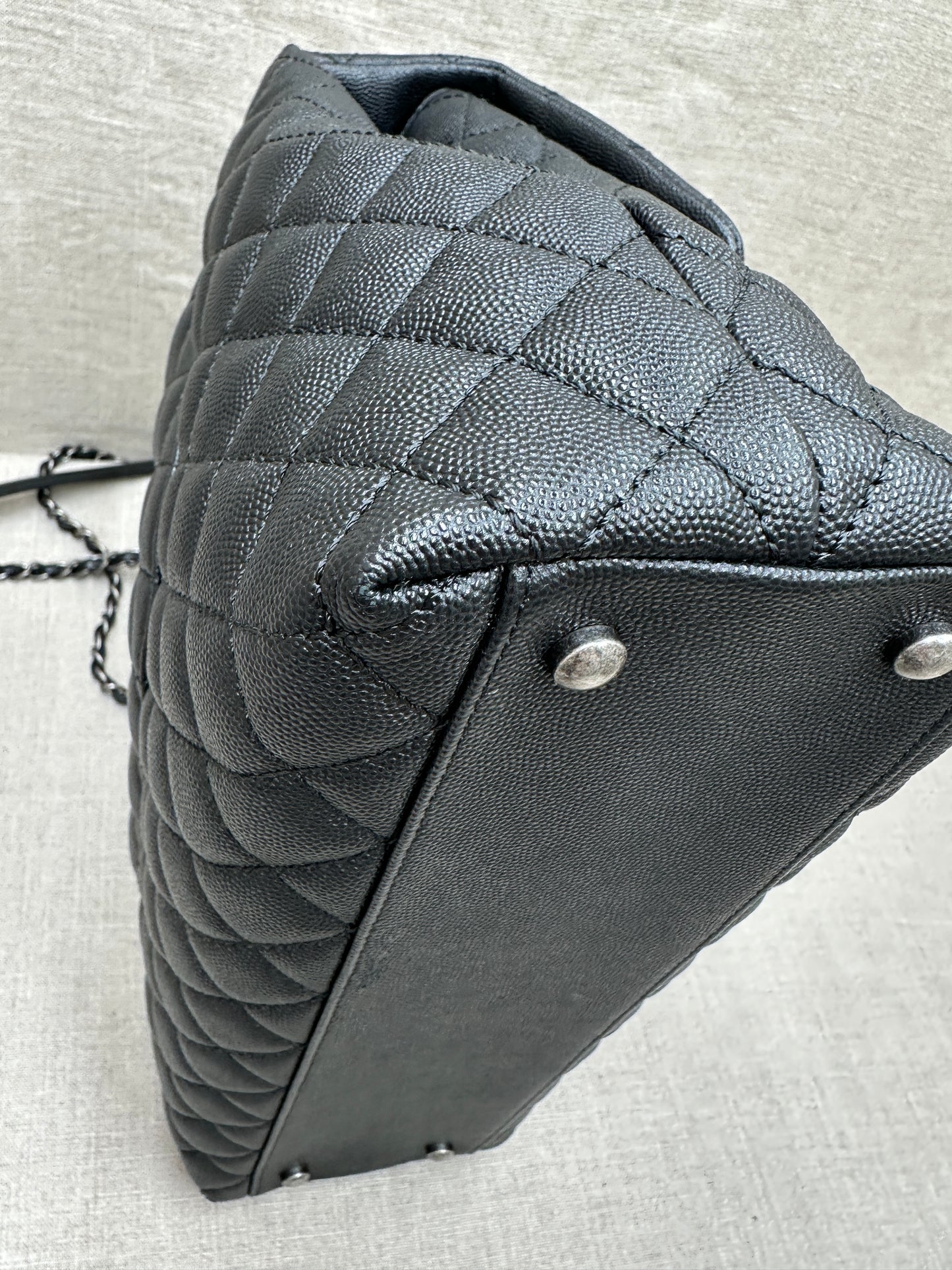 Chanel Maxi Flap Bag top handle