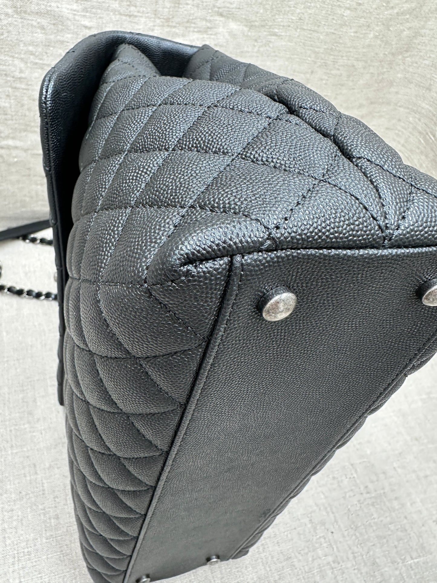 Chanel Maxi Flap Bag top handle