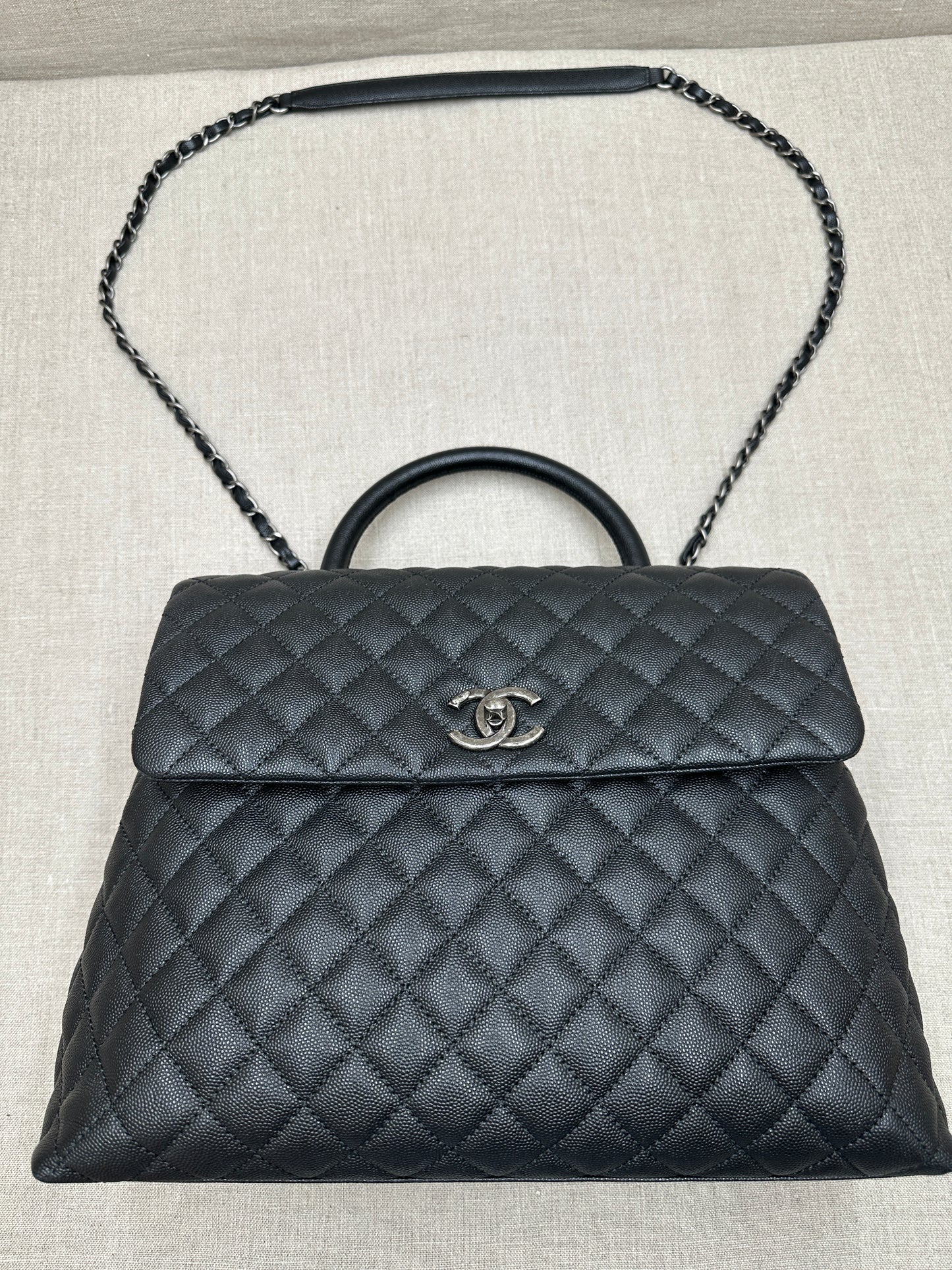 Chanel Maxi Flap Bag top handle