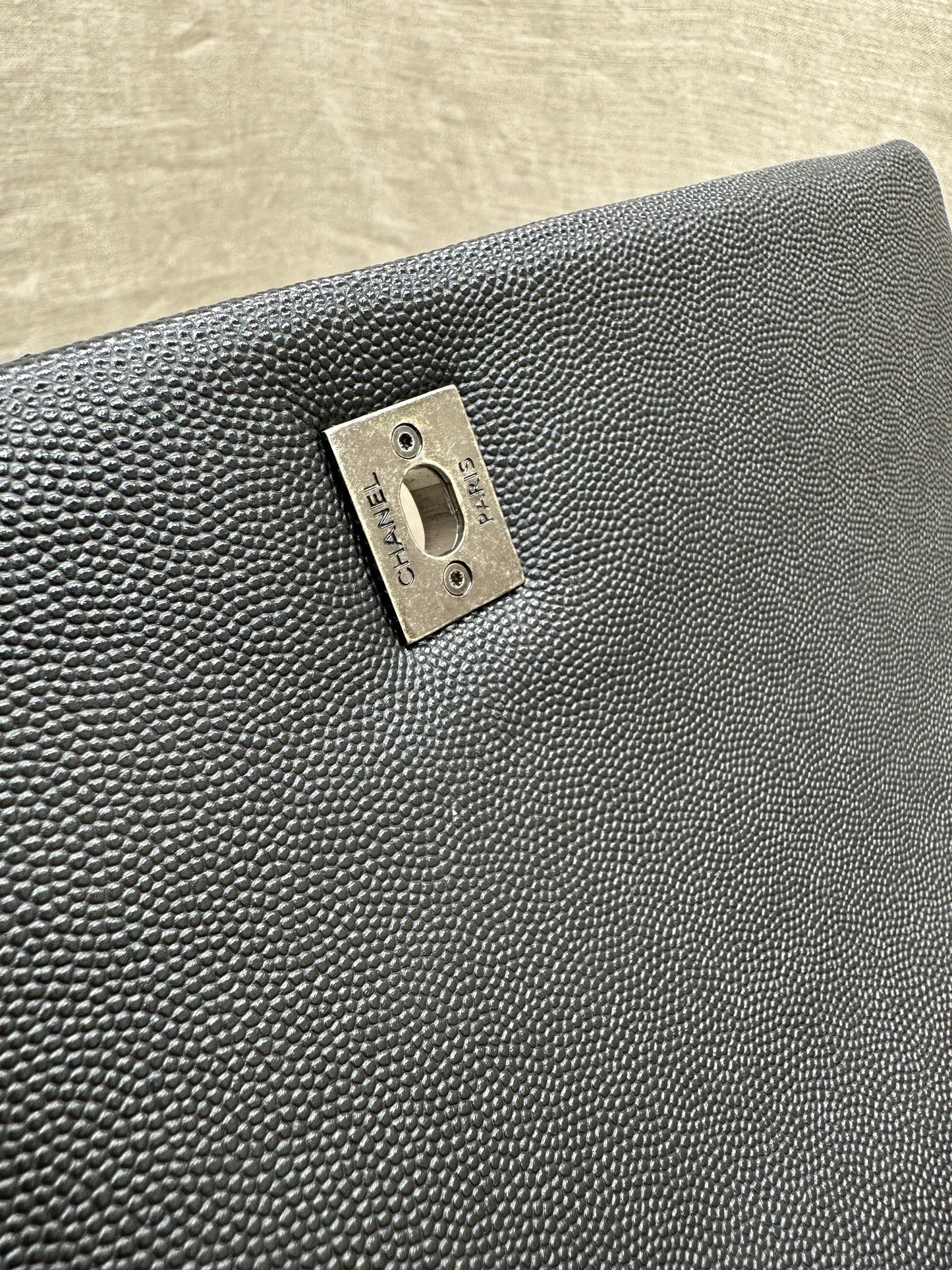 Chanel Maxi Flap Bag top handle