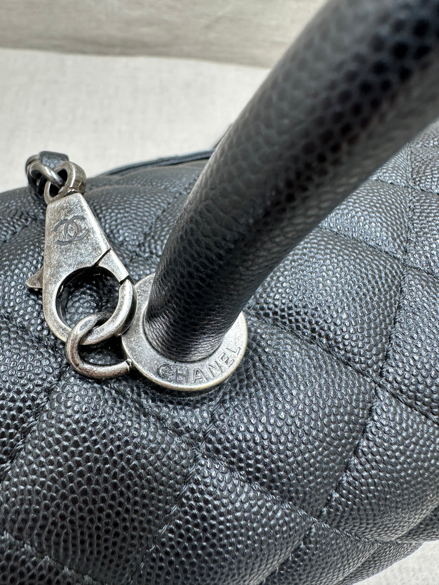Chanel Maxi Flap Bag top handle