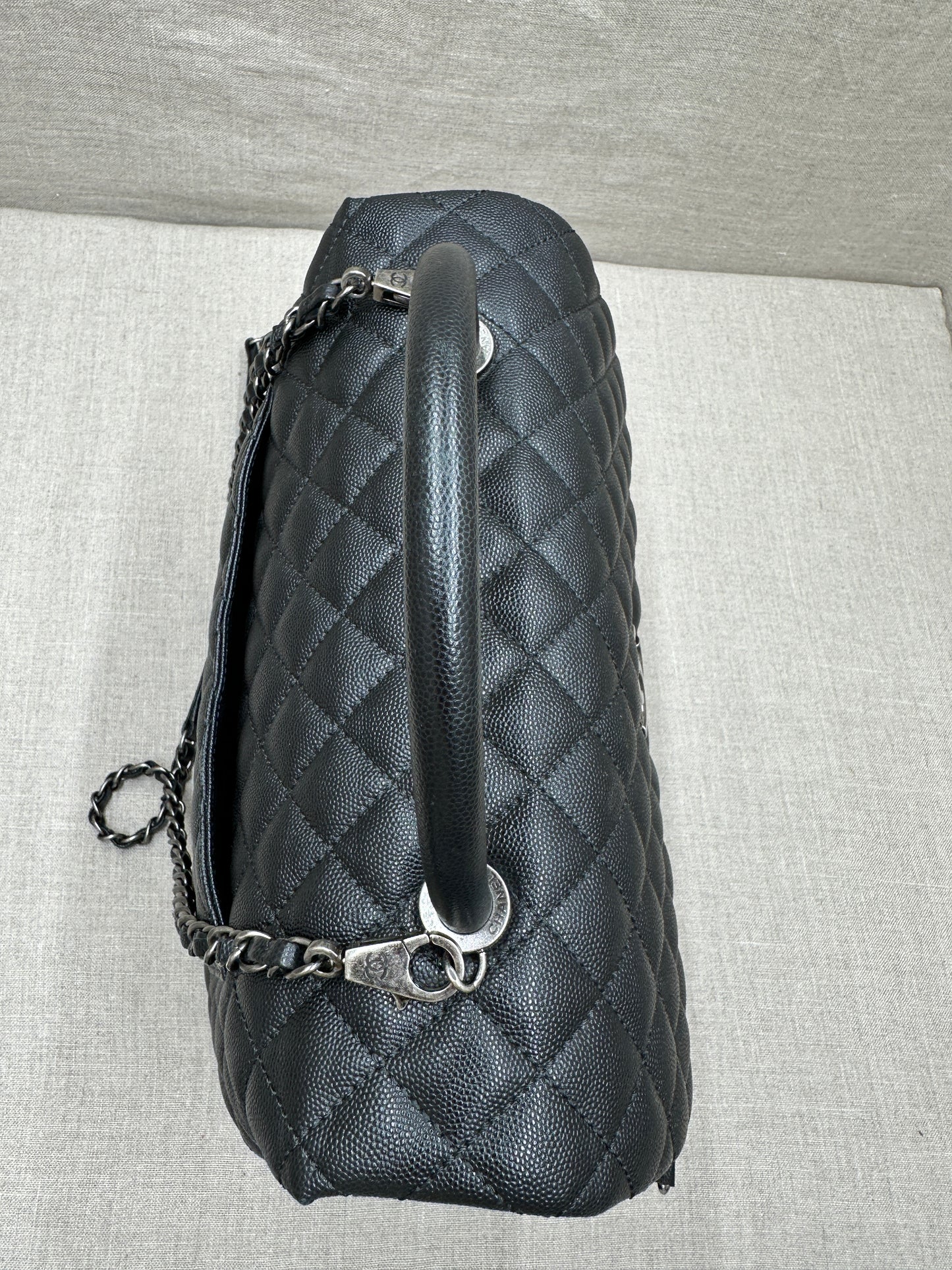 Chanel Maxi Flap Bag top handle