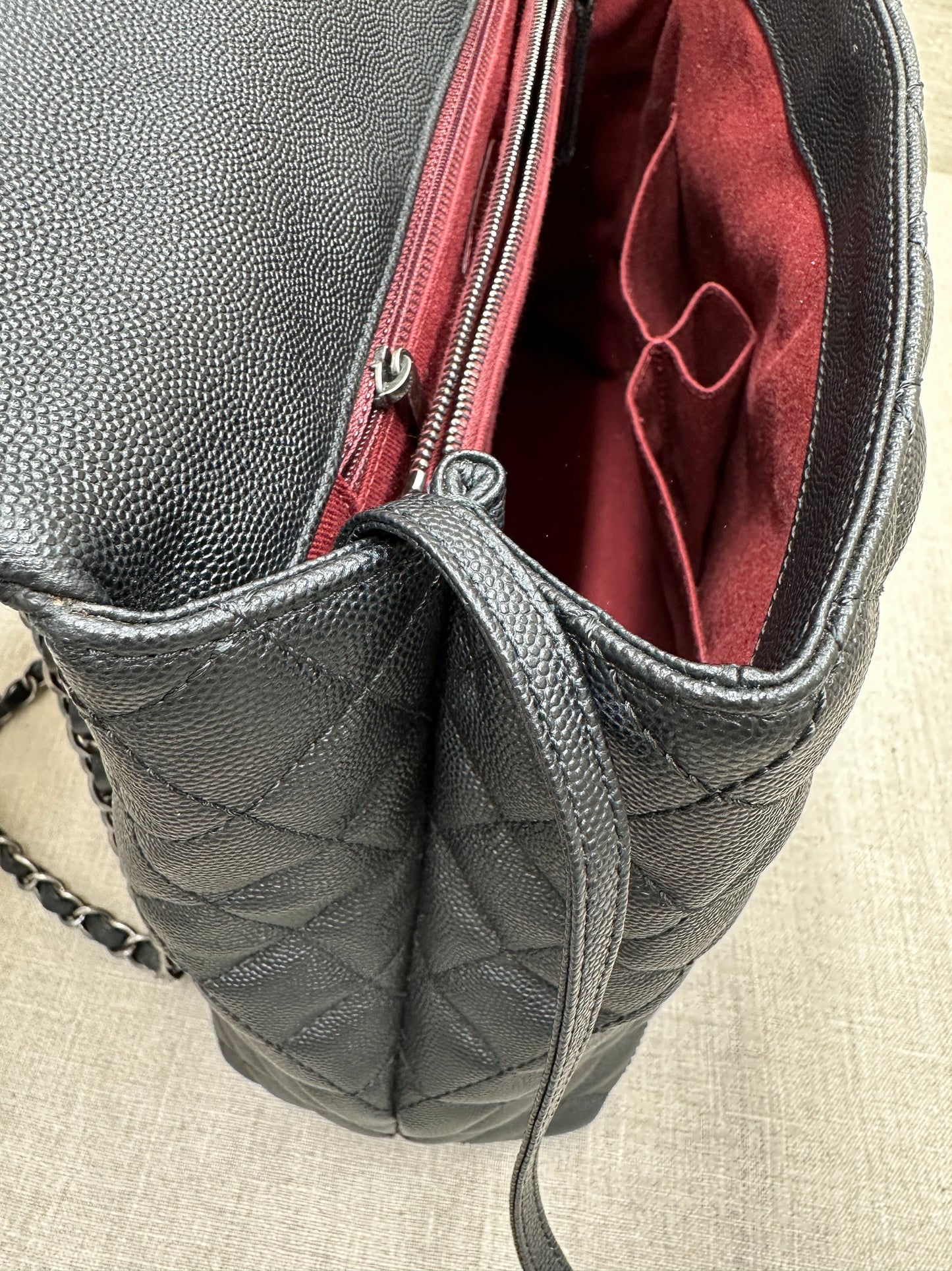 Chanel Maxi Flap Bag top handle