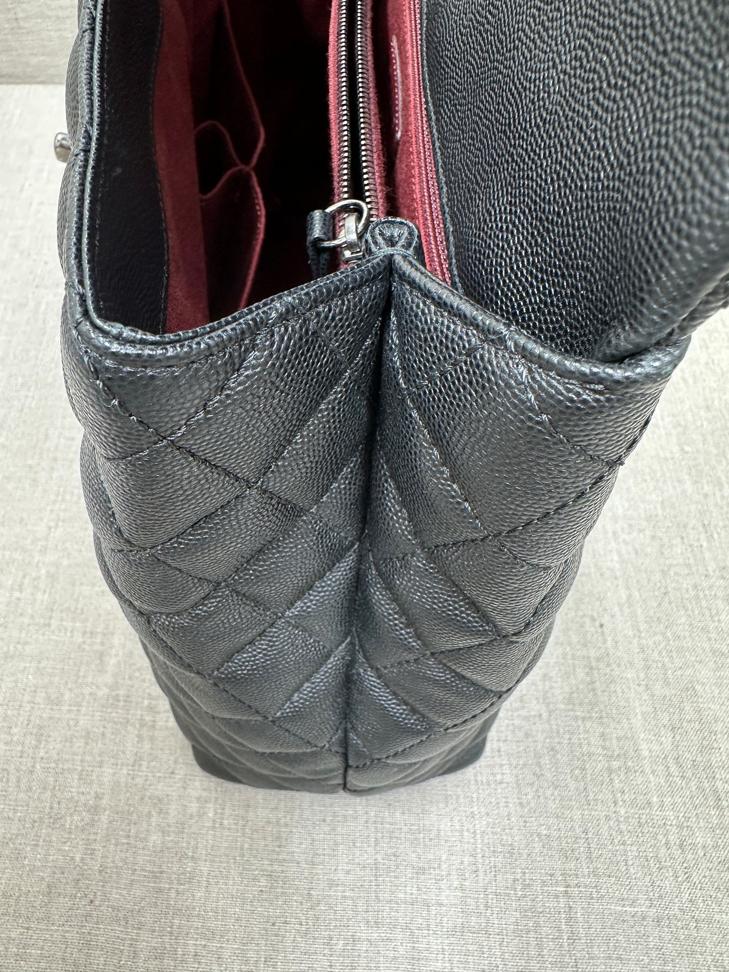 Chanel Maxi Flap Bag top handle