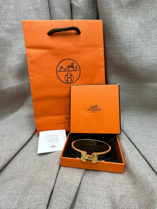 Hermès Clic H armband svart/guld