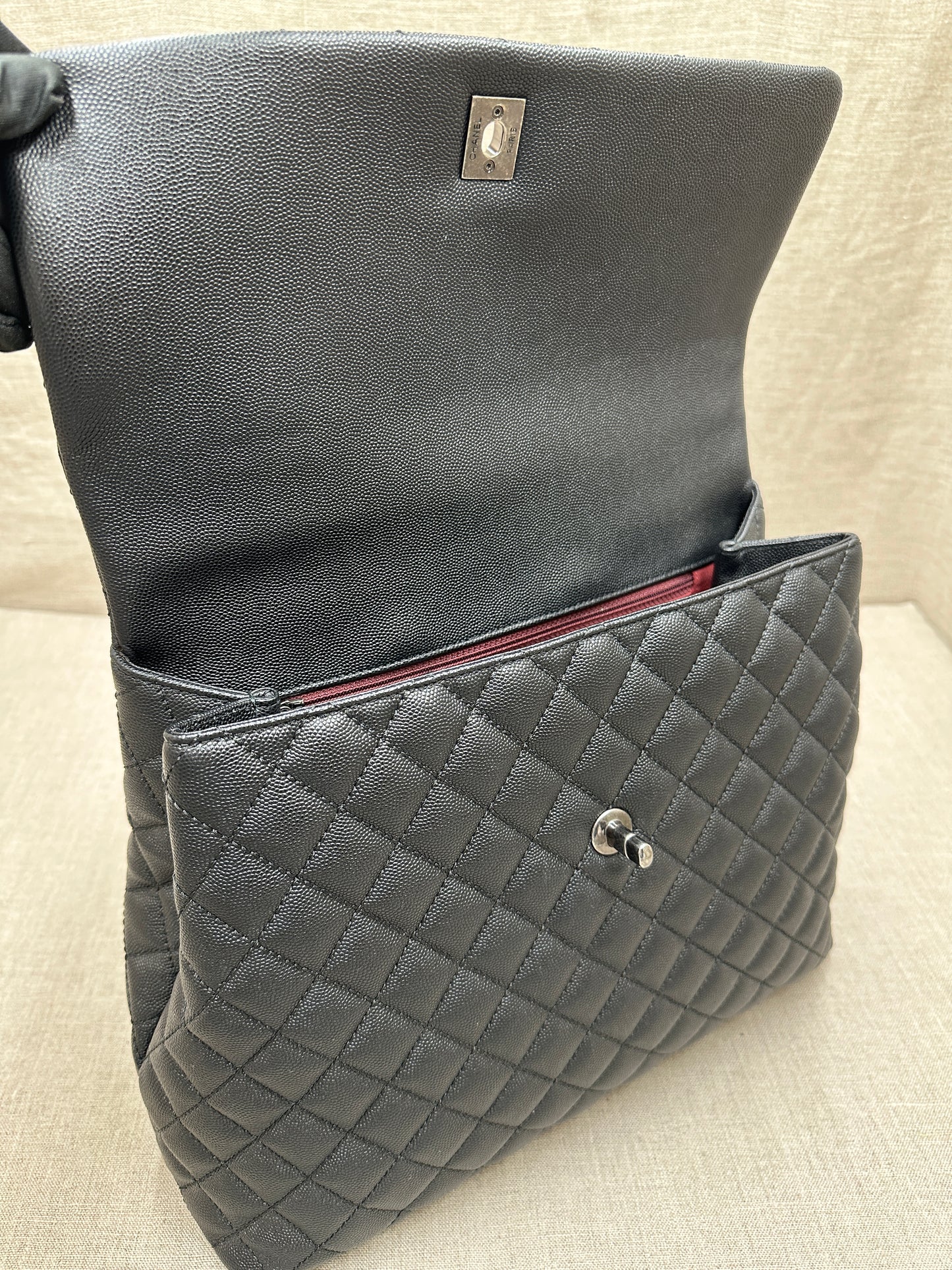 Chanel Maxi Flap Bag top handle