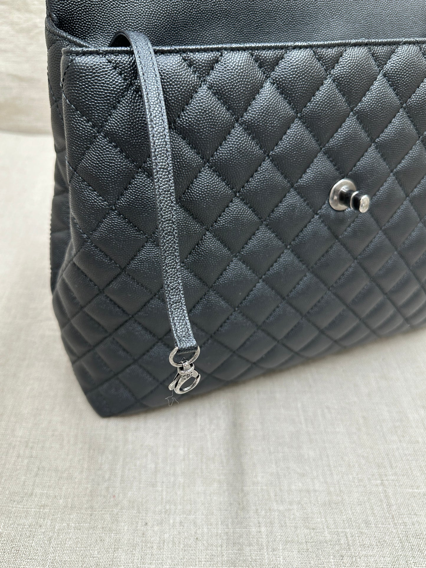 Chanel Maxi Flap Bag top handle