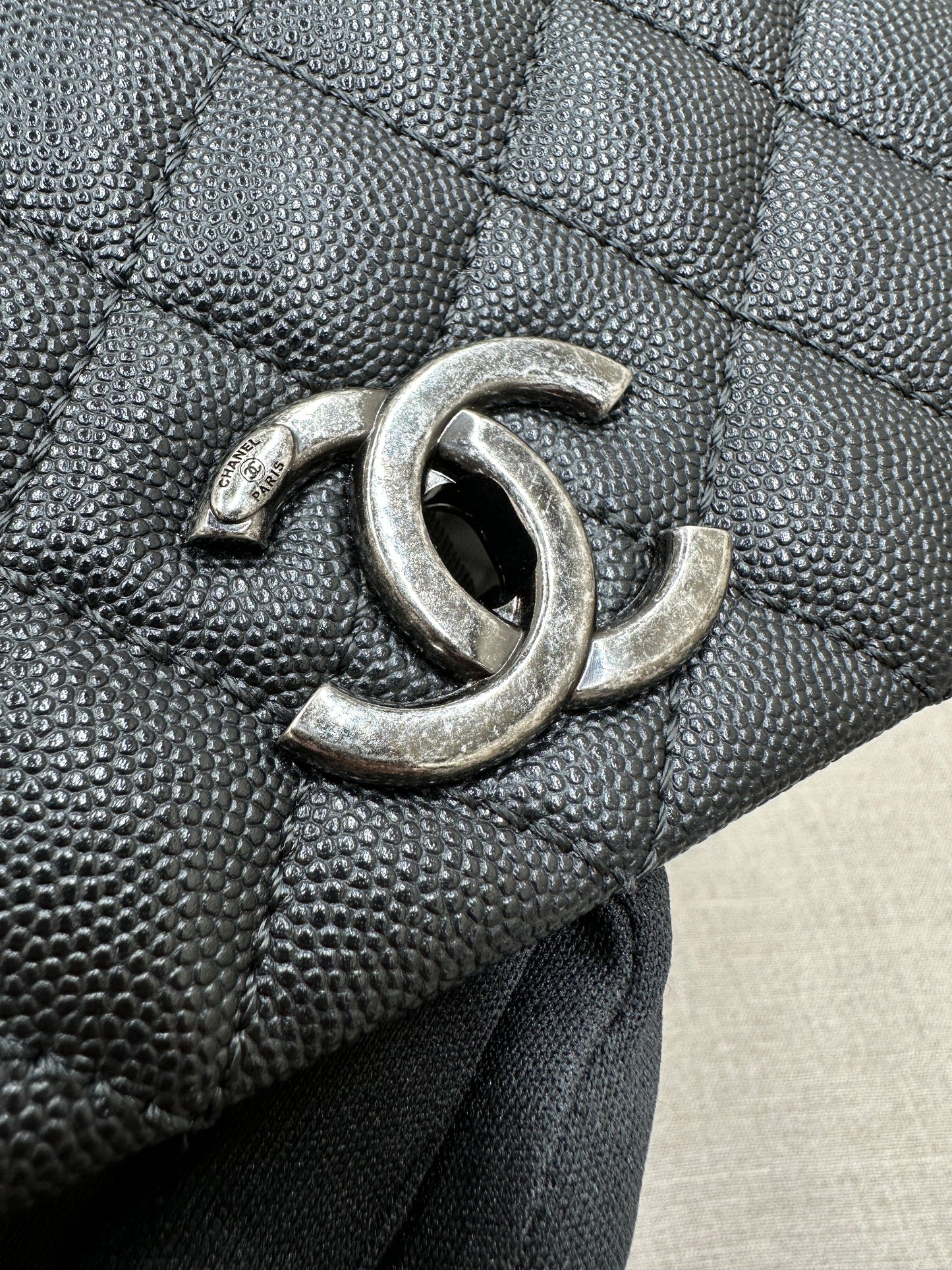 Chanel Maxi Flap Bag top handle