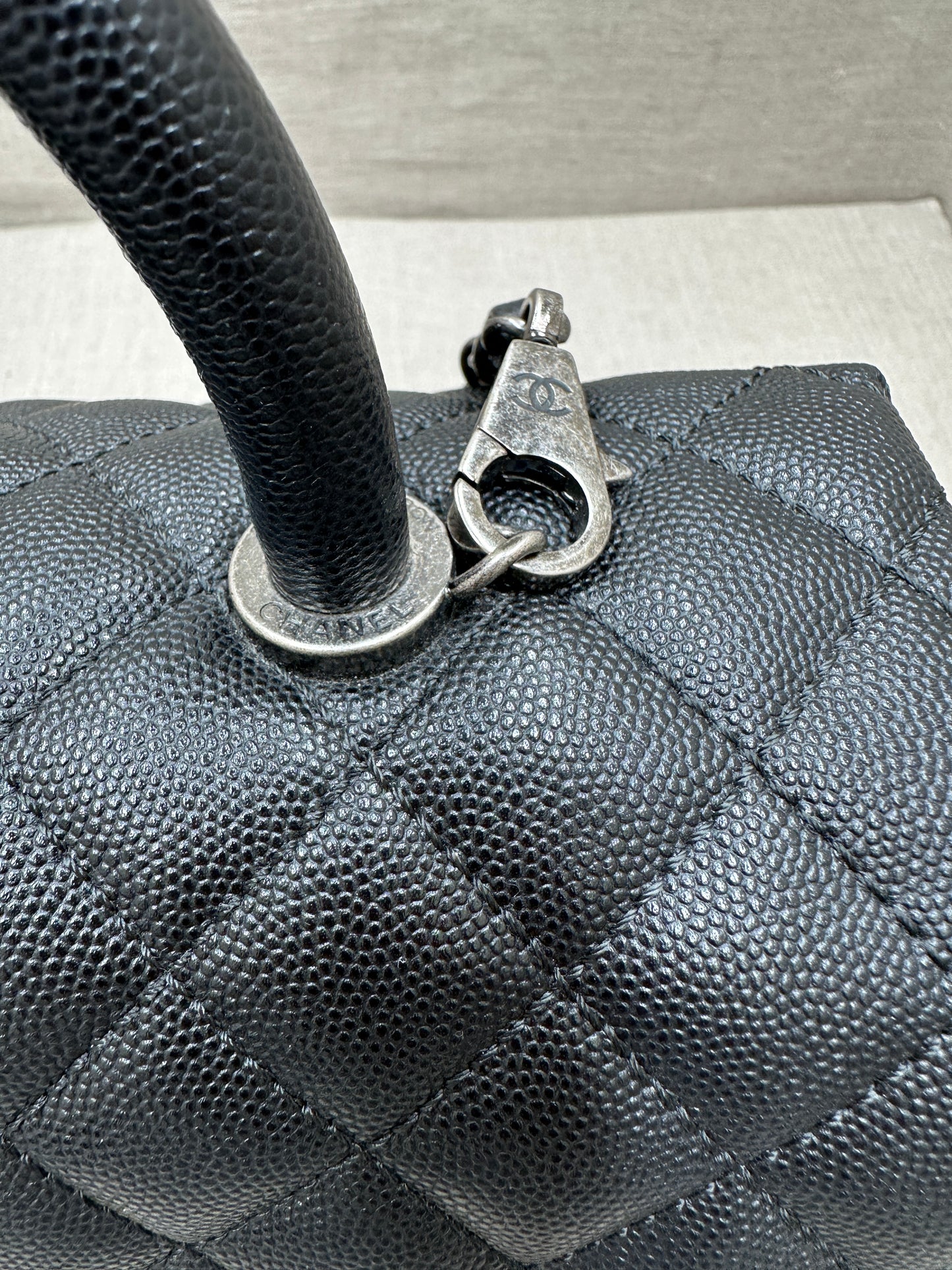 Chanel Maxi Flap Bag top handle
